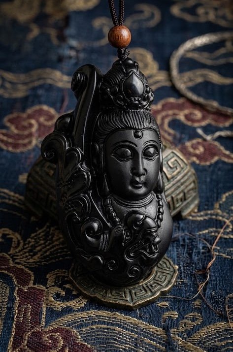 B09 Guanyin’s Flow Obsidian Pendant